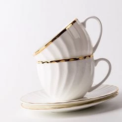 Staunton And Henry Elegant White Tea Cup And Saucer With Gold Detail