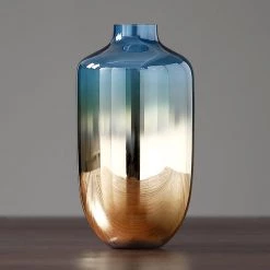 Staunton And Henry Home Accessories Blue And Bronze Glass Vase