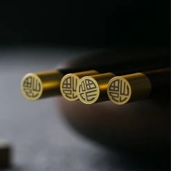 Staunton And Henry Ebony Wood Chopsticks - Set Of 5 - Gold